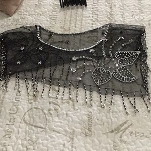 Dramatic top embellishment